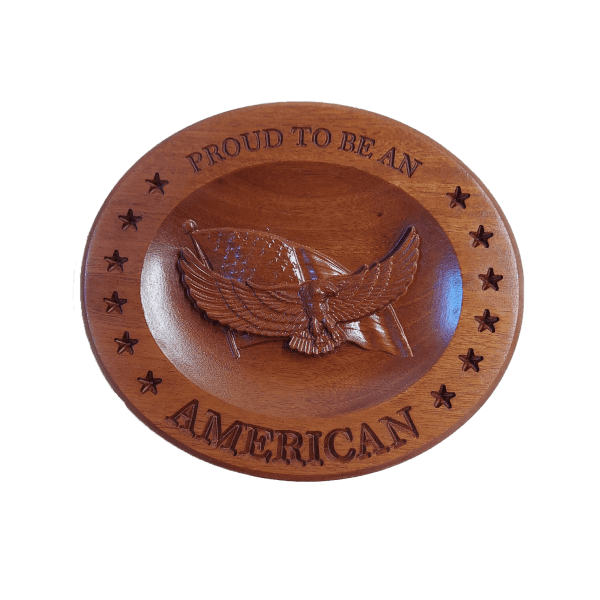 A wooden plate with an eagle and stars on it.
