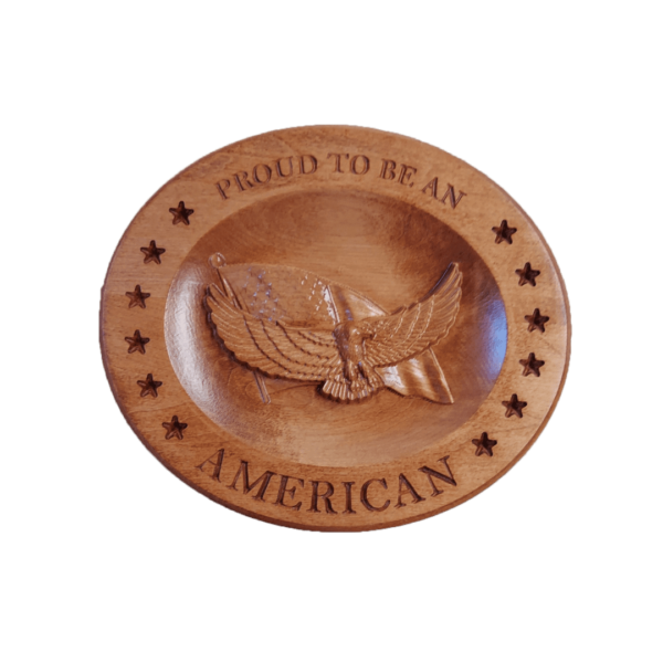 A wooden plate with an eagle on it.